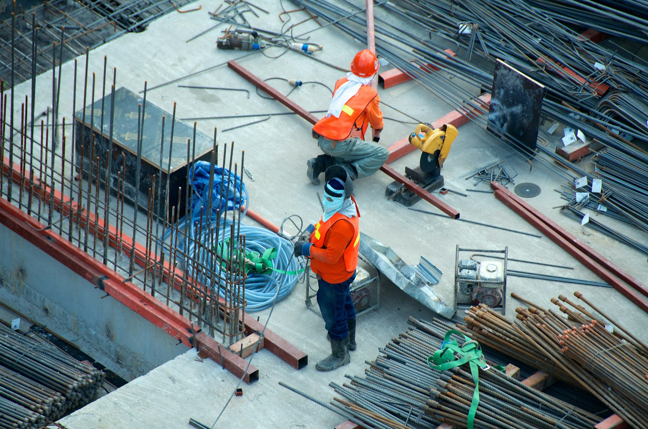 Large construction site with multiple tower cranes building high-rise structures
